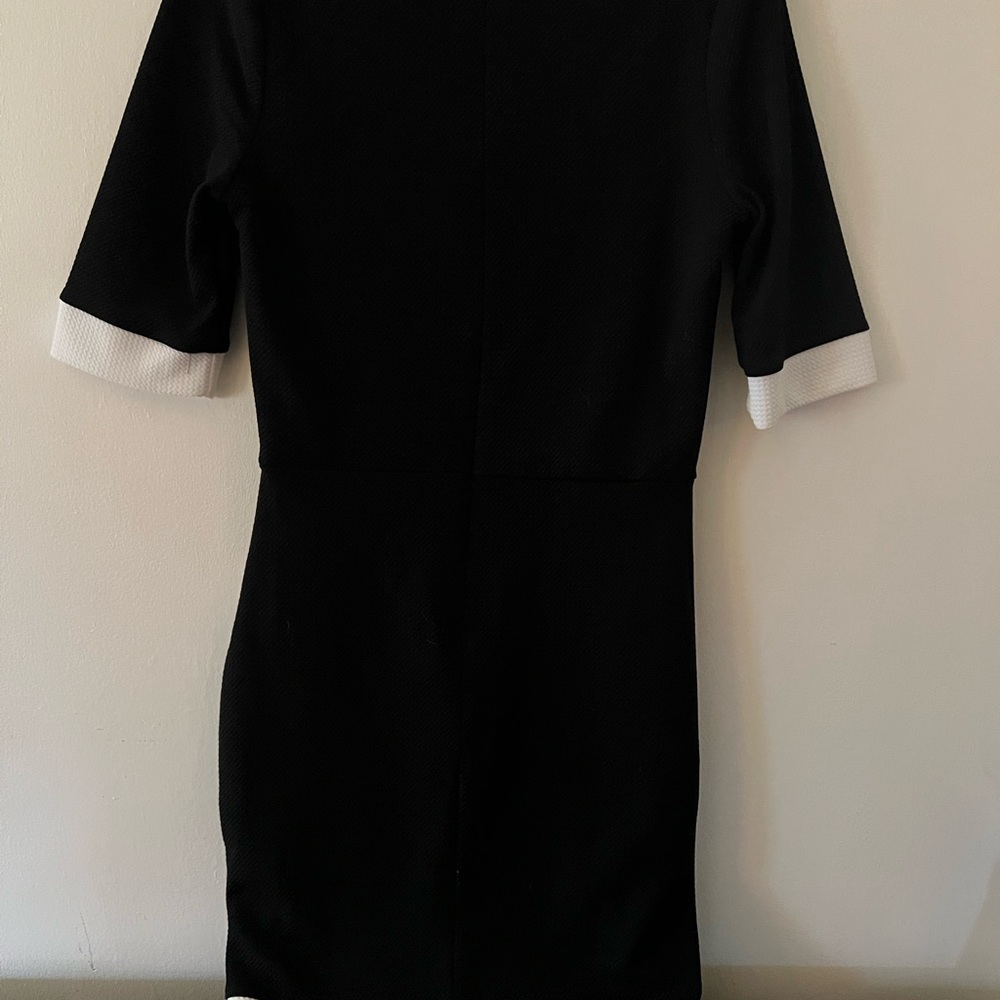 Black dress with white trim. - Picture 2 of 5